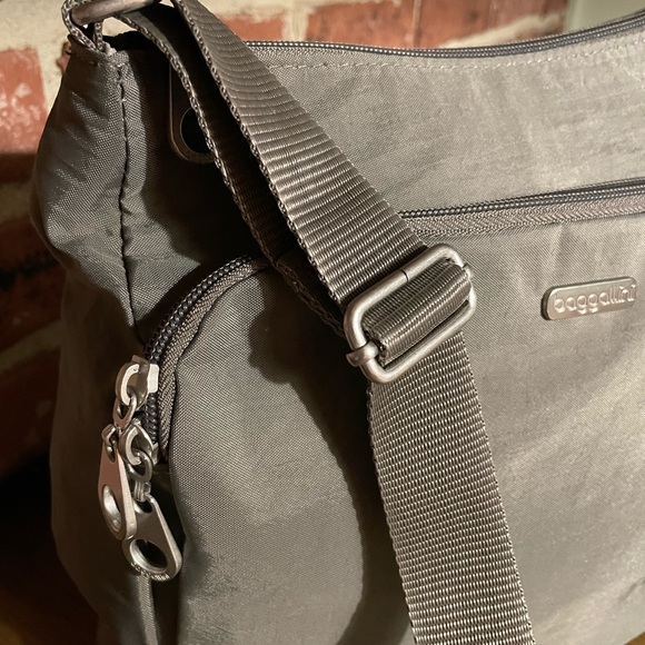 Baggallino Crossbody Bag. Color-taupe. Zipper closures, adj strap. Nylon/Poly. - Picture 5 of 10